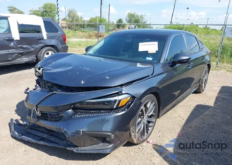 2024 Honda Civic Touring z USA, uszkodzony, nr VIN 2HGFE1F99RH302324